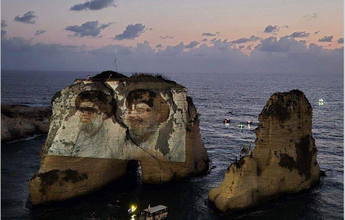 حزب الله يكسر قرار الحكومة بإضاءة صخرة الروشة بصور نصرالله وصفي الدين - أخبار السعودية